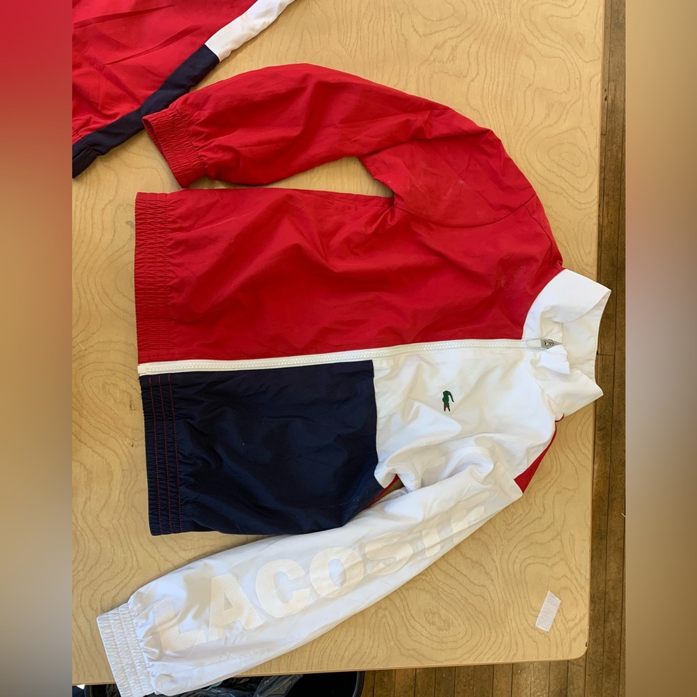Lacoste track suit.